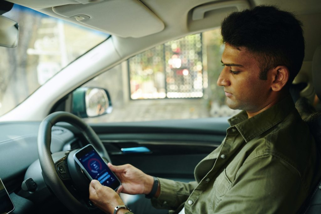 Driver Using Smart Charger App